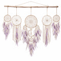 Attrape-rêves mural bohème avec plumes violettes et blanches